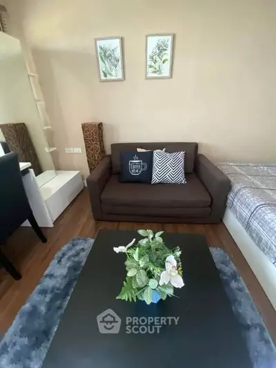 Cozy living room with modern decor and comfortable seating