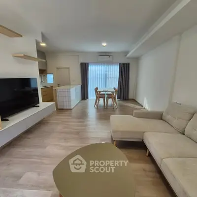 Spacious modern living room with open layout and stylish furniture