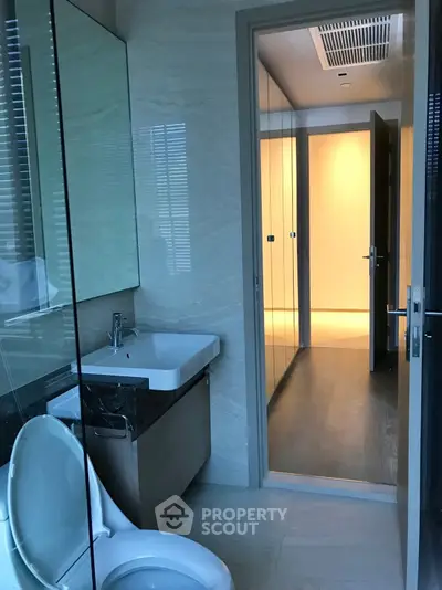 Modern bathroom with sleek design and glass shower enclosure
