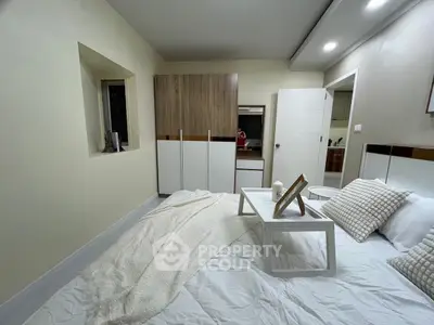 Modern bedroom with stylish decor and cozy ambiance