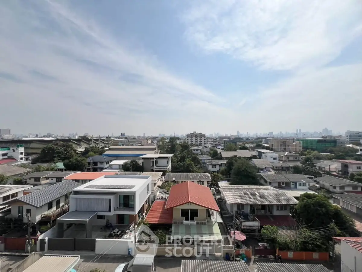 Stunning aerial view of suburban neighborhood with modern homes and lush greenery, perfect for family living.
