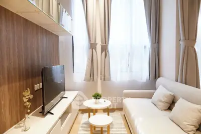 Cozy modern living room with natural light and stylish decor