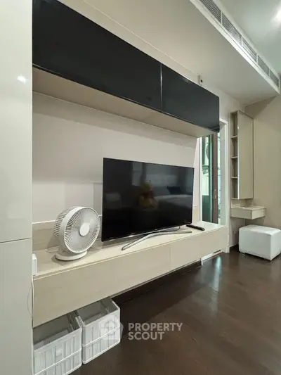 Modern living room with sleek TV unit and stylish decor