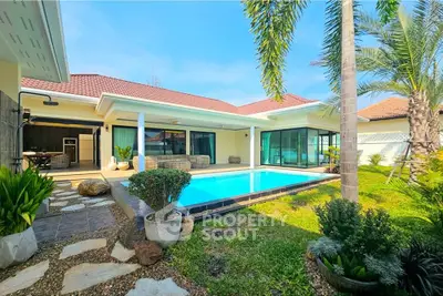 Luxurious villa with private pool and lush garden, perfect for relaxation and entertaining.