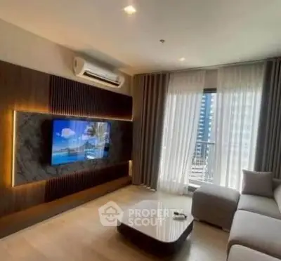 Modern living room with stylish decor and large window view