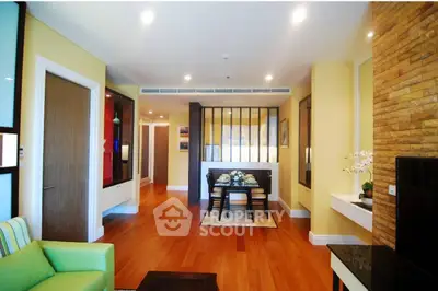 Spacious living room with elegant dining area and modern decor