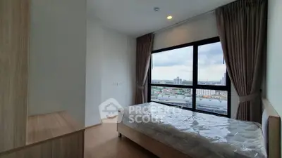 Modern bedroom with large window offering city view, featuring minimalist design and natural light.