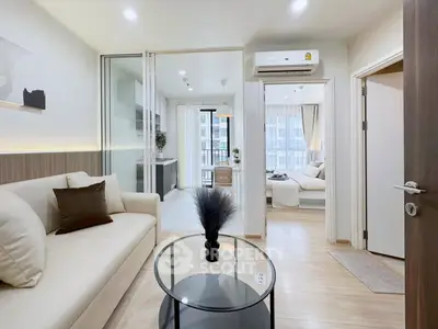 Modern apartment with open layout, cozy living room, and stylish decor.