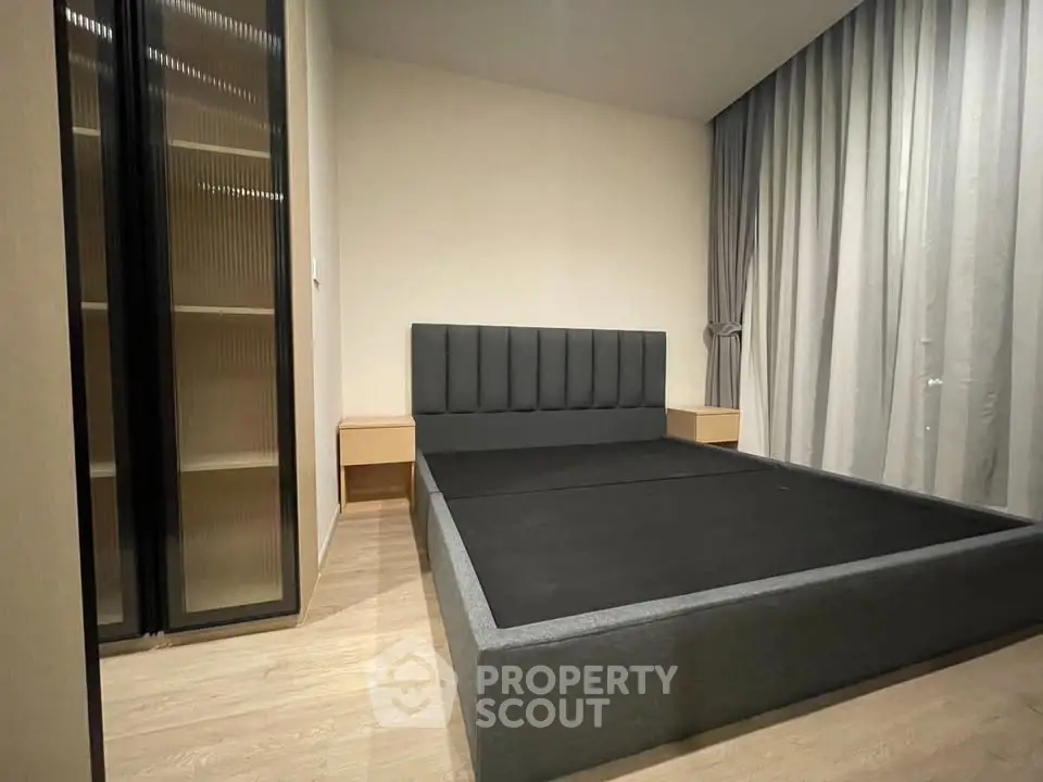 Modern bedroom with sleek design and ample storage space