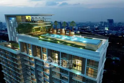 Luxurious high-rise building with rooftop pool and stunning city views at dusk.
