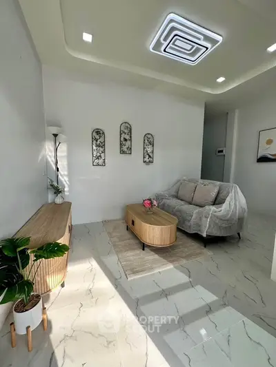 Modern living room with stylish furniture and elegant decor