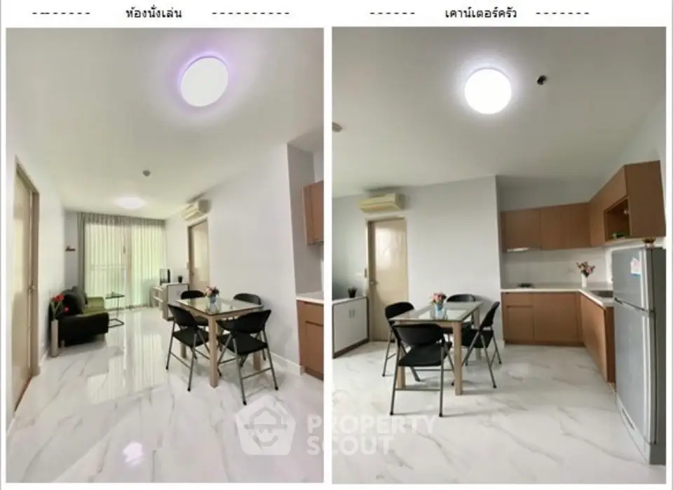Modern open-plan living and dining area with sleek kitchen in a bright apartment.