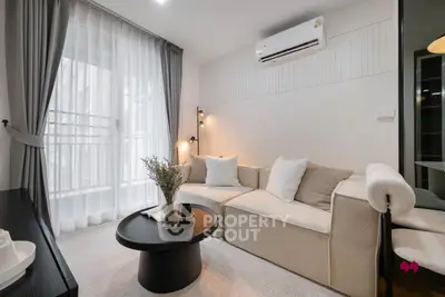 Modern living room with cozy beige sofa and elegant decor