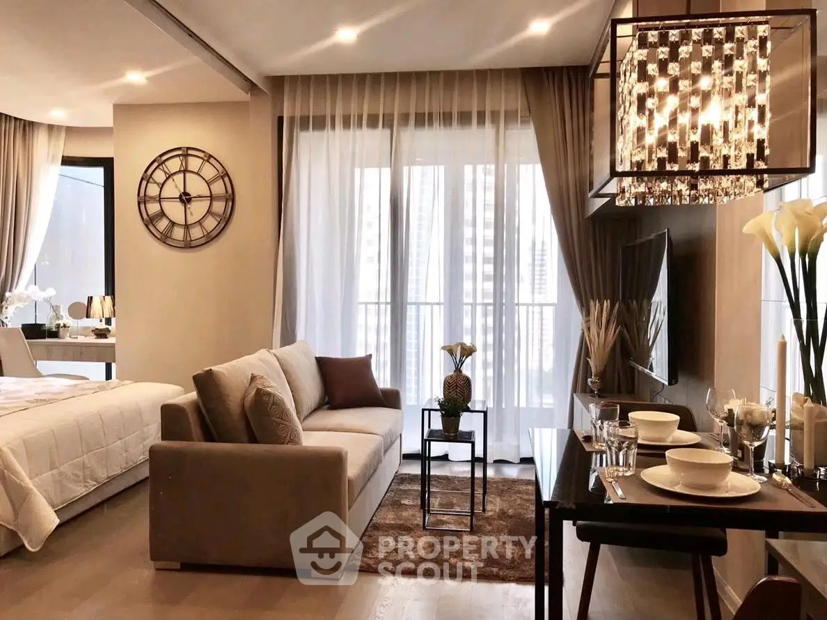 Luxurious modern living room with elegant decor and open layout, featuring a cozy sofa and stylish dining area.