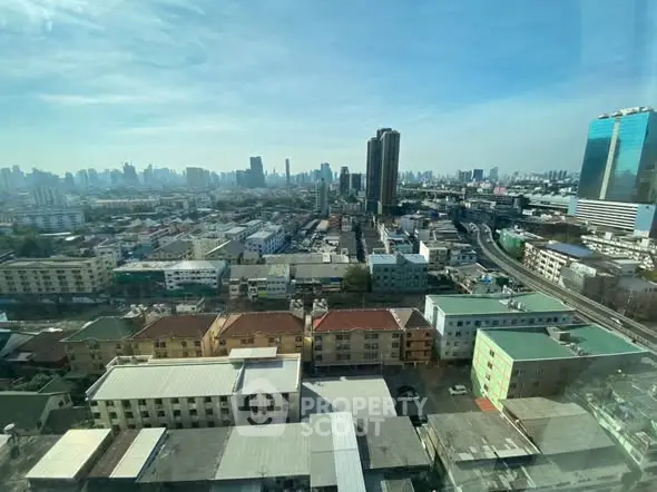 Stunning cityscape view from high-rise building showcasing urban skyline and architecture.