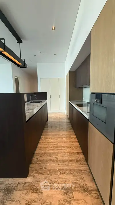 Modern kitchen with sleek design and high-end appliances in luxury apartment