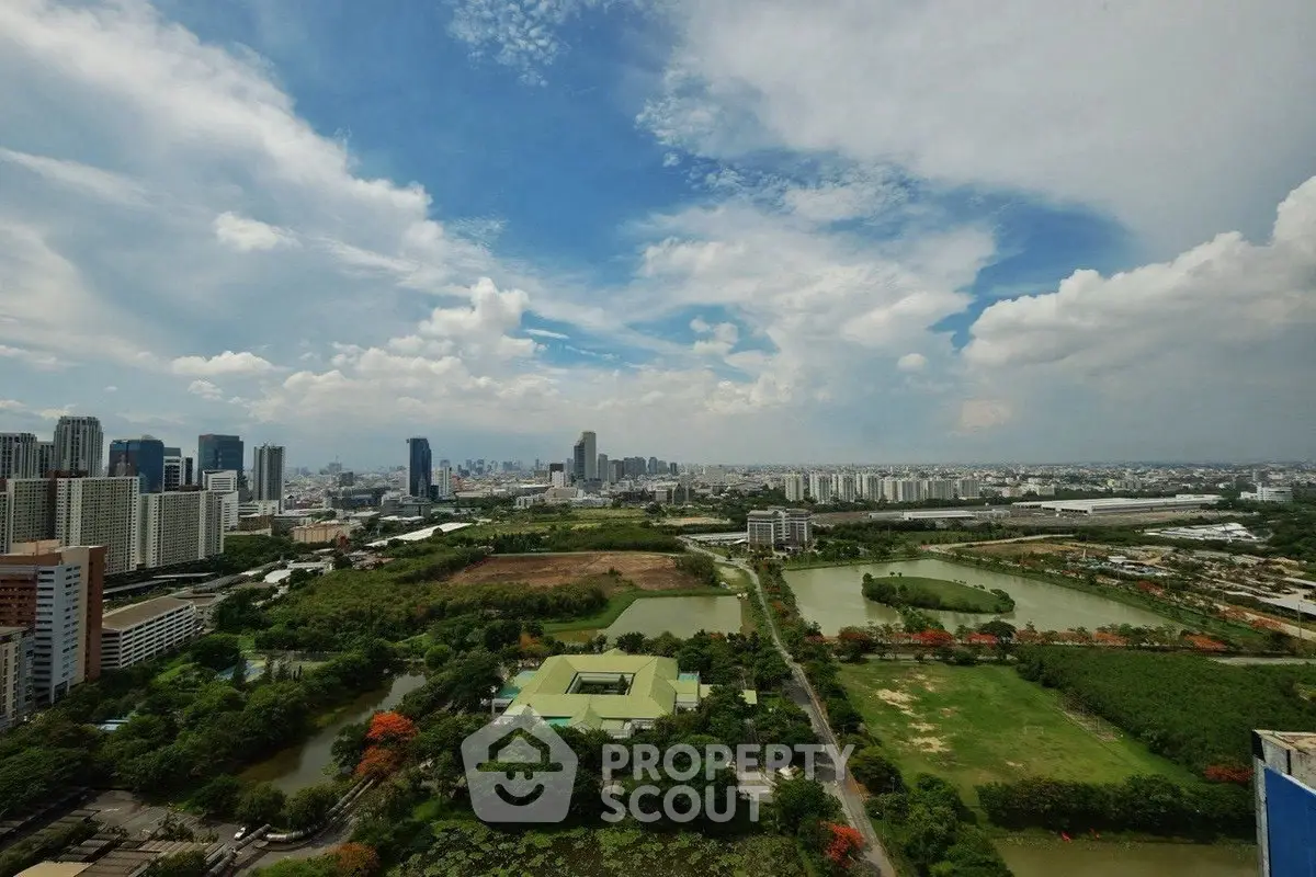 Stunning cityscape view with lush greenery and skyline, perfect for urban living enthusiasts.