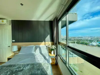 Stunning bedroom with panoramic city view and modern decor