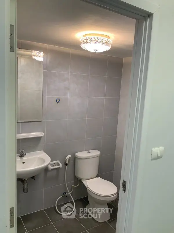 Modern bathroom with sleek fixtures and elegant lighting