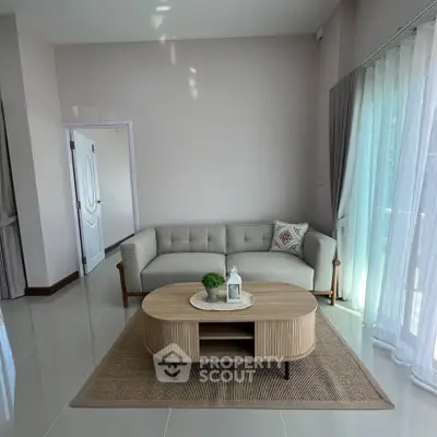 Modern living room with elegant sofa and natural light