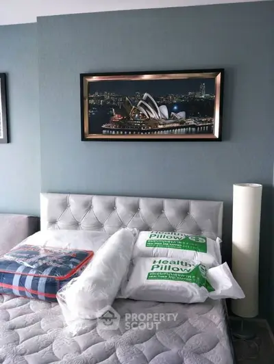 Modern bedroom with stylish decor and comfortable bedding