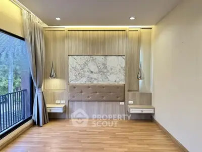 Elegant bedroom with modern design and large window view