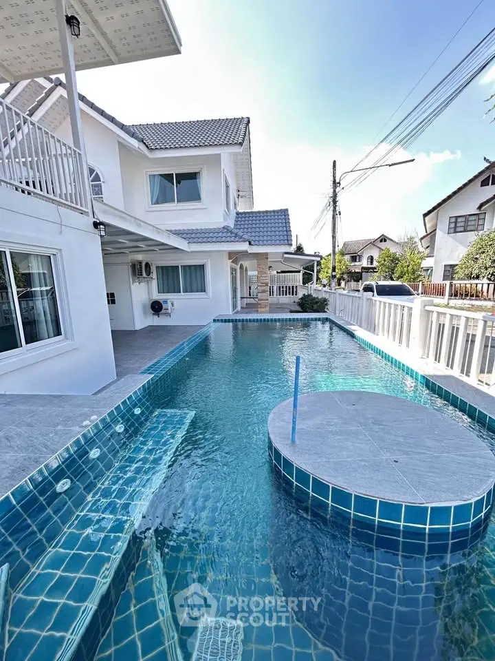 Stunning residential property with a private pool and modern architecture, perfect for luxury living.