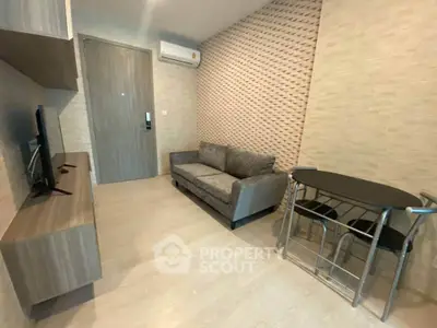 Modern living room with stylish furniture and textured wall design