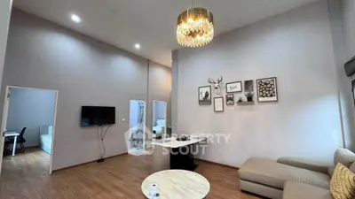 Spacious modern living room with high ceiling and elegant decor
