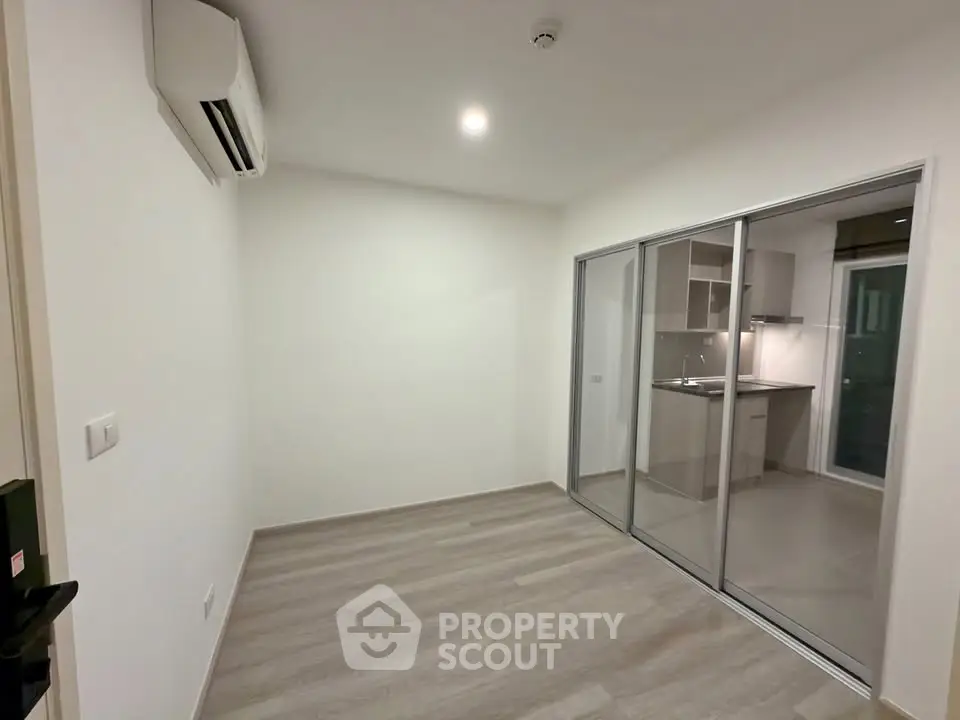 Modern apartment with sleek kitchen and spacious living area