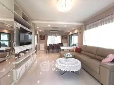 Spacious modern living room with elegant decor and ample natural light