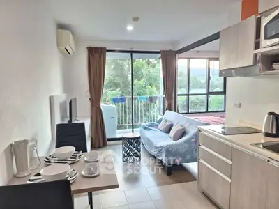Modern open-plan living room with balcony and scenic view
