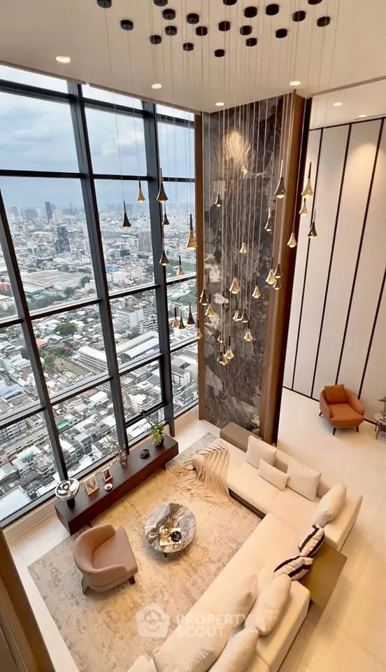 Luxurious high-rise living room with panoramic city views and elegant decor