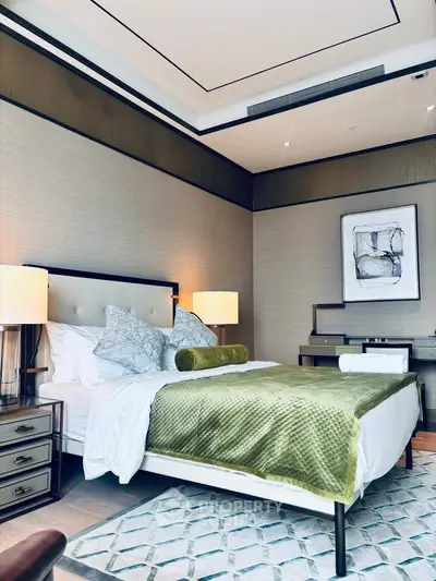 Luxurious bedroom with elegant decor and modern furnishings, featuring a plush bed and stylish lighting.
