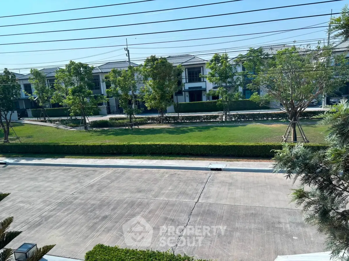 Charming suburban neighborhood with lush greenery and modern homes, perfect for family living.