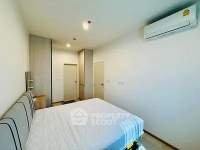 Modern bedroom with air conditioning and minimalist design