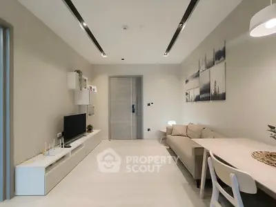 Modern living room with sleek furniture and minimalist decor, perfect for contemporary urban living.