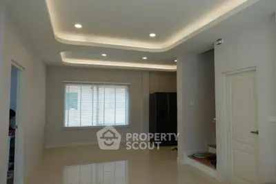 Modern interior with recessed lighting and sleek design in a spacious room