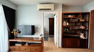 Stylish living room with wooden furniture and modern decor