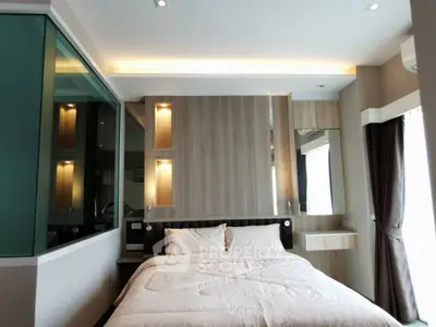 Modern bedroom with elegant lighting and stylish decor
