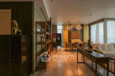 Luxurious living room with elegant decor and chandelier lighting