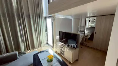 Modern living room with loft design and natural light