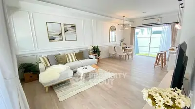 Spacious modern living room with elegant decor and natural light