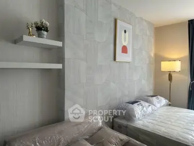 Modern bedroom with stylish decor and cozy lighting