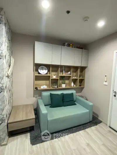 Modern living room with stylish shelving and cozy seating