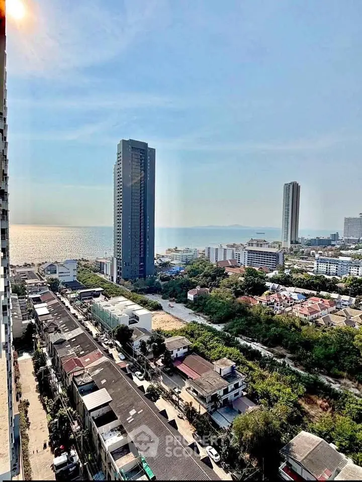 Stunning high-rise cityscape with ocean view from balcony