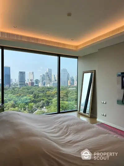 Luxurious bedroom with stunning city view and floor-to-ceiling windows