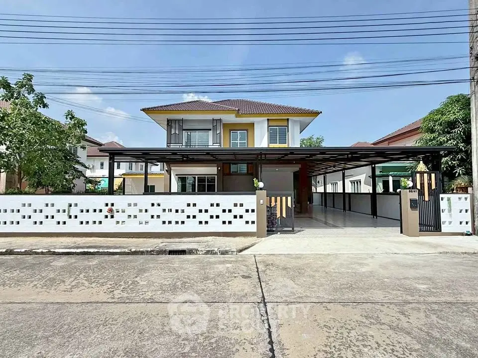 Modern two-story house with spacious driveway and stylish facade in a serene neighborhood.