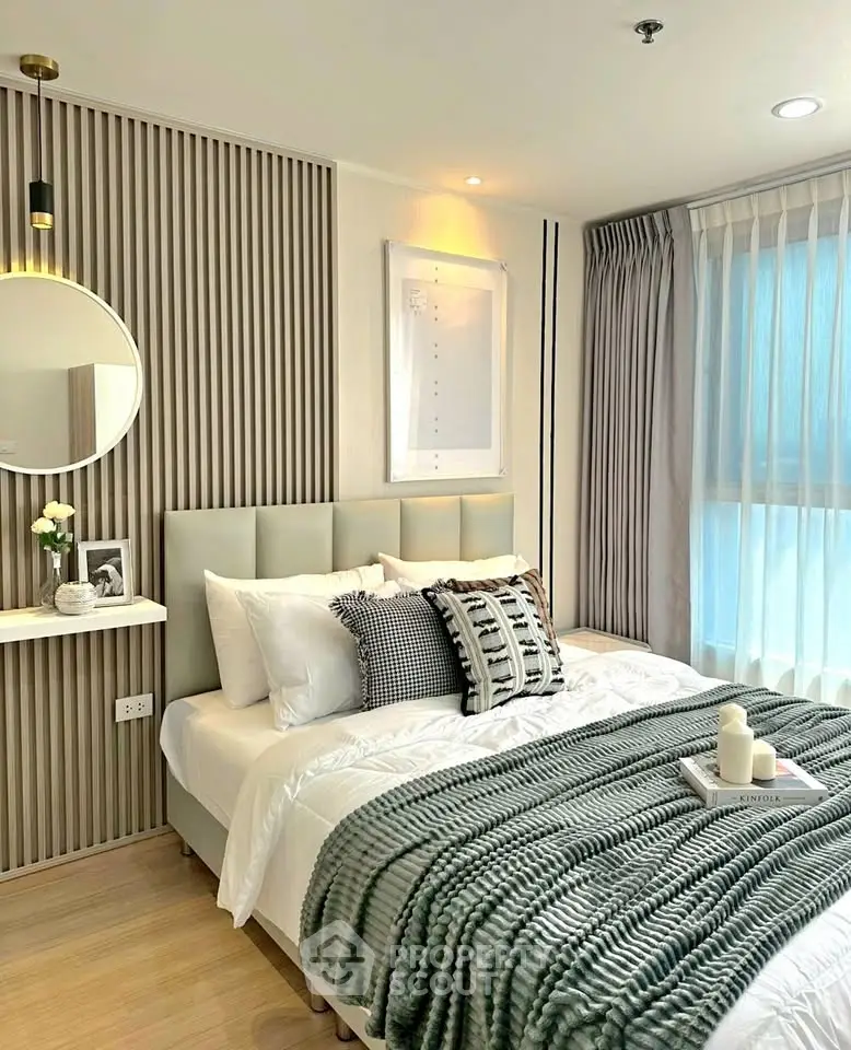 Modern bedroom with stylish decor and natural light