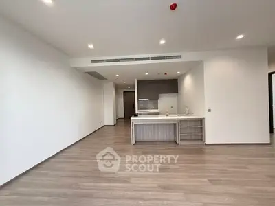Spacious modern kitchen with open layout and sleek design.